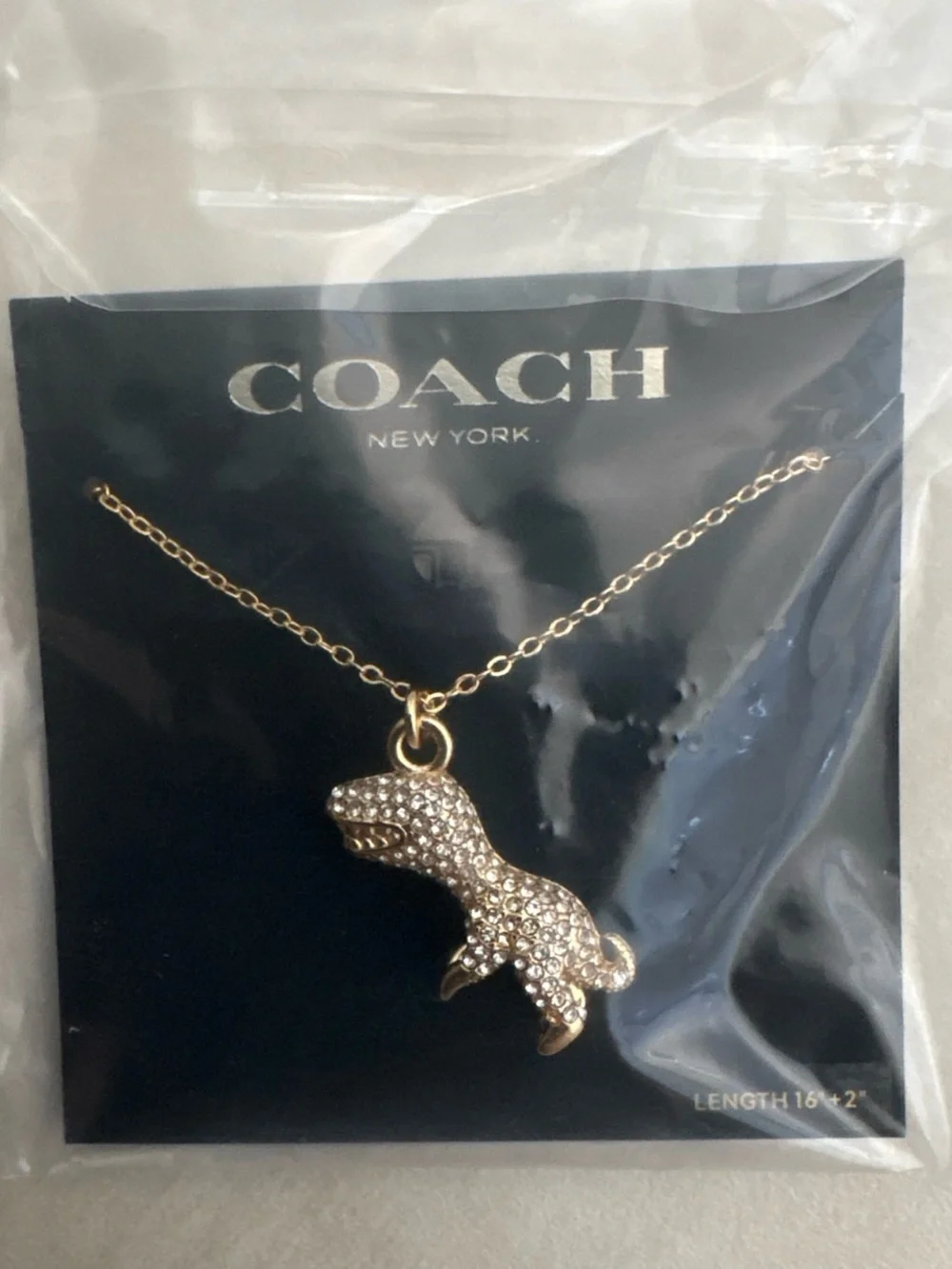 Coach Gold-tone T-Rex Pendant Necklace